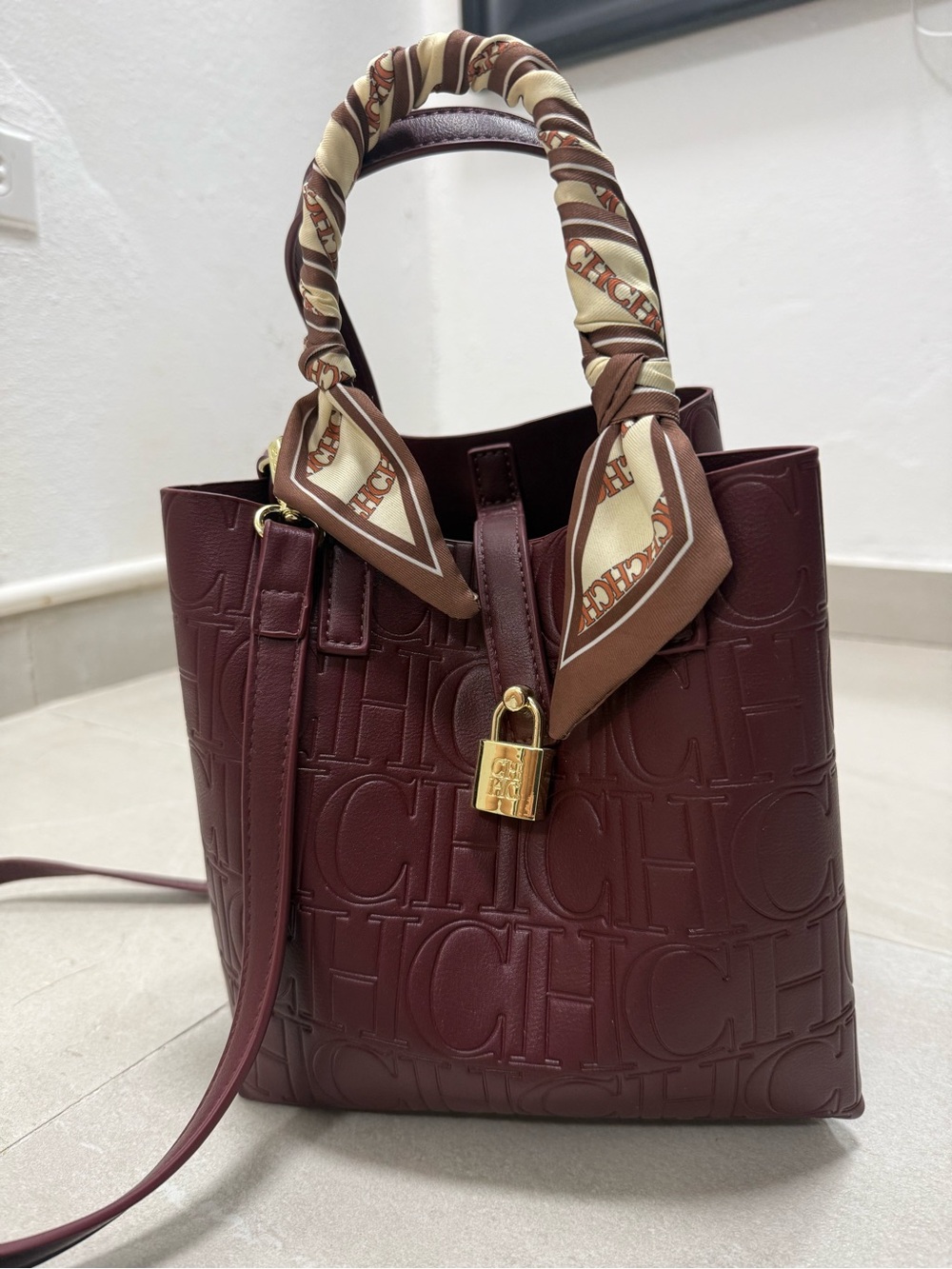 Signature Embossed Bucket Bag in Deep Burgundy